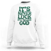 White crewneck sweatshirt with green "It's Never Luck" "It's Always God" text graphic