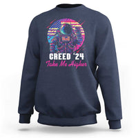 Navy crewneck sweatshirt with astronaut graphic and “Creed ’24 Take Me Higher” text