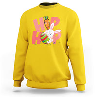 Yellow crewneck sweatshirt with bunny graphic and colorful 'HOP' print on chest