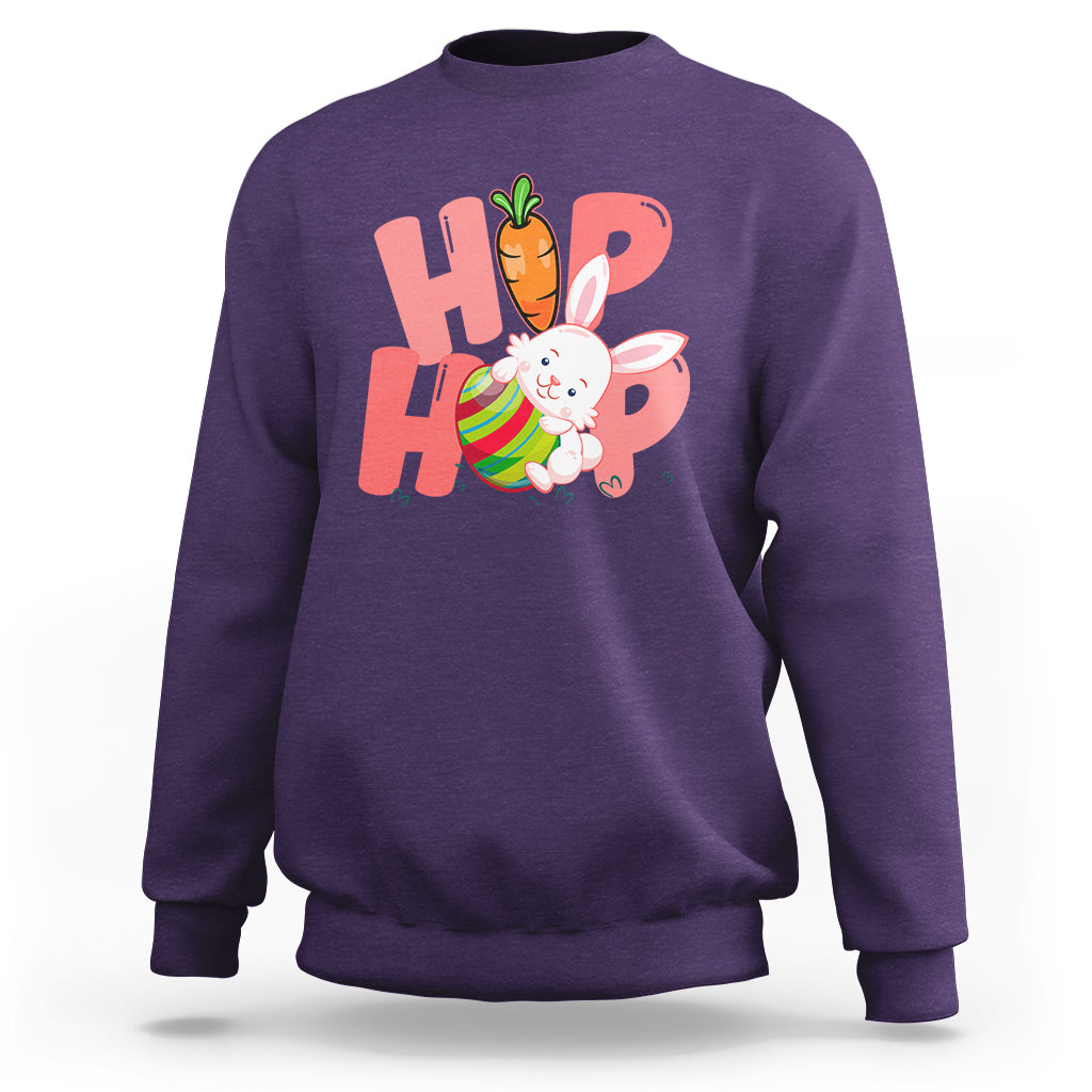 Purple crewneck sweatshirt with bunny graphic and colorful 'HOP' print on chest