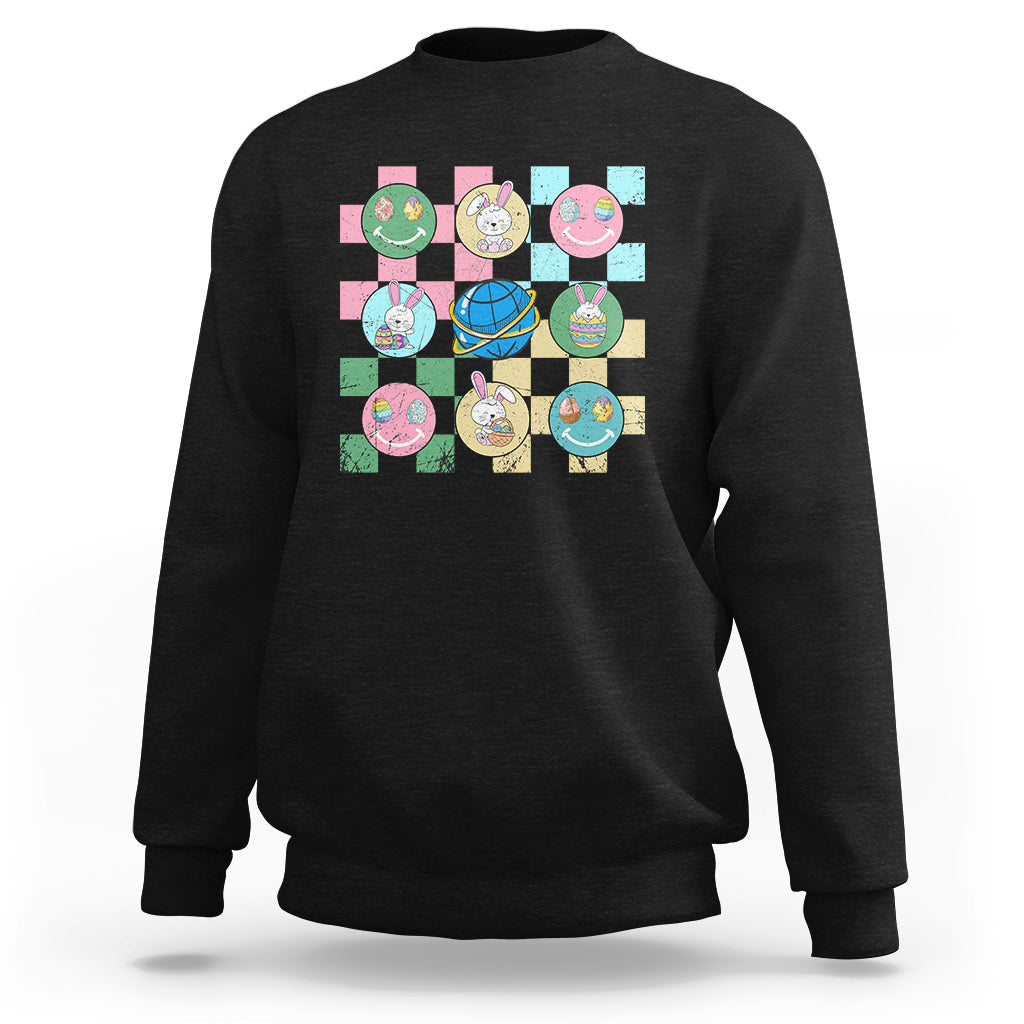Easter-themed sweatshirt in dark charcoal with colorful bunny-and-egg square graphic