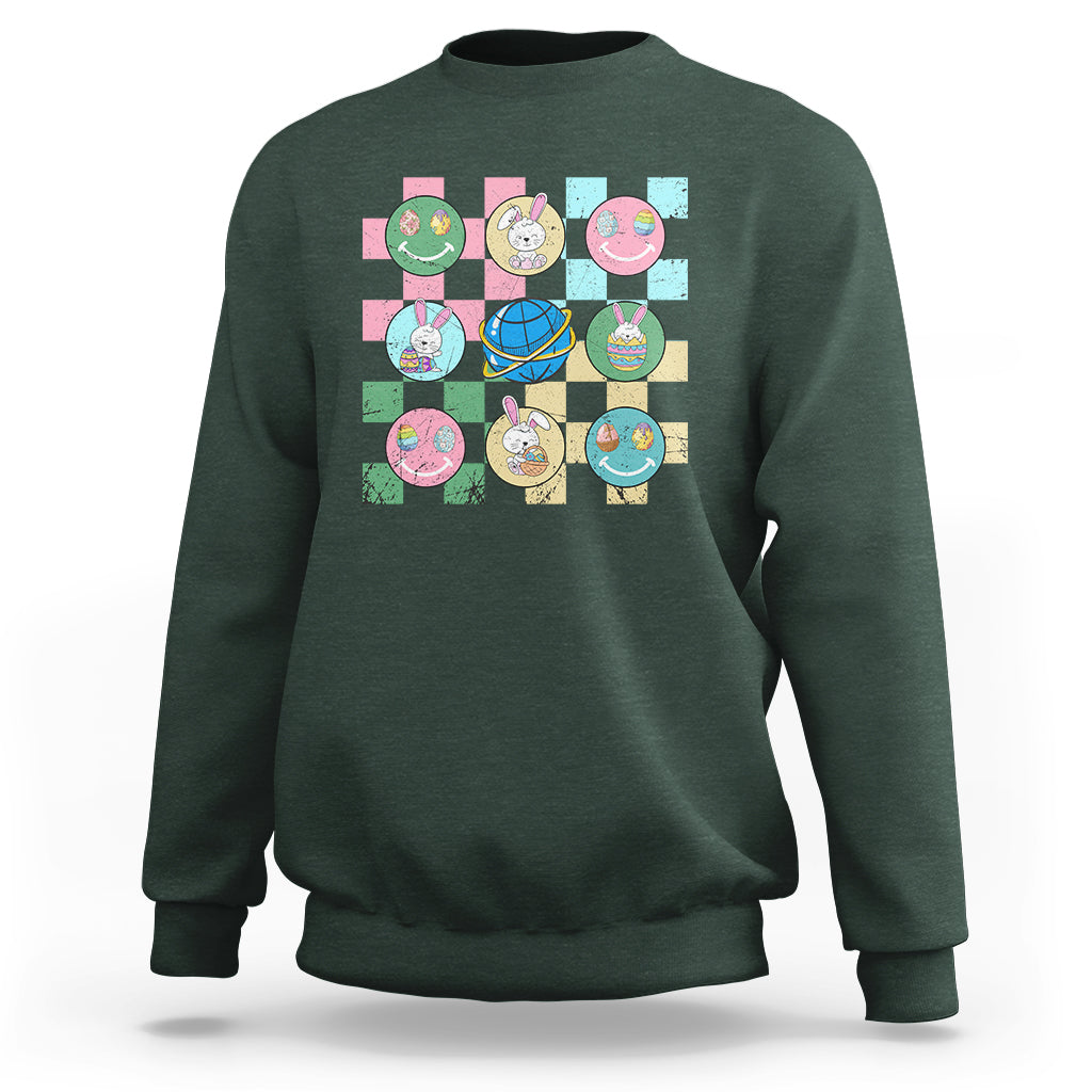 Easter-themed sweatshirt in forest green with colorful bunny-and-egg square graphic