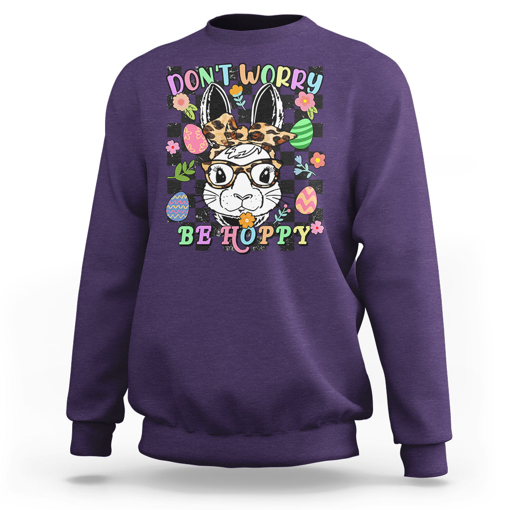 Purple crewneck sweatshirt with bunny-rabbit "Don't Worry Be Hoppy" graphic