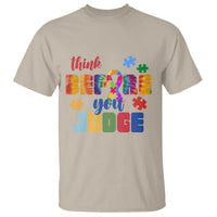 Sand autism awareness T-shirt with colorful puzzle and “Believe you unite” text graphic