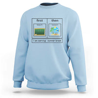Light blue crewneck sweatshirt with “first teach then beach” graphic and “I am earning: summer break”