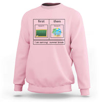Light pink crewneck sweatshirt with “first teach then beach” graphic and “I am earning: summer break”