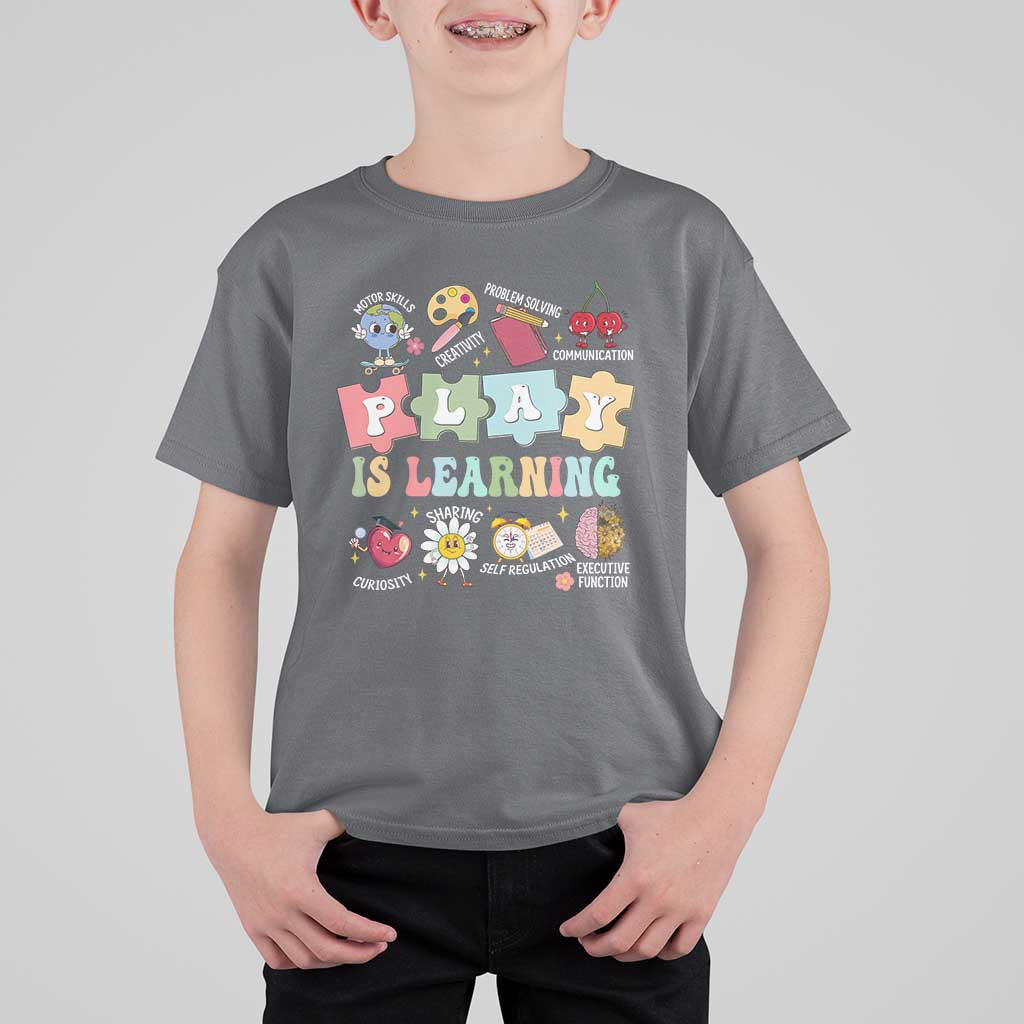 Kids charcoal gray T-shirt with colorful PLAY IS LEARNING classroom graphic