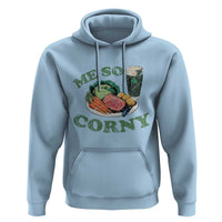 Light blue hoodie with front pocket and hood; “Me So Corny” graphic with corned beef and cabbage
