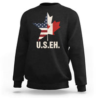Black sweatshirt with U.S.E.H text and US/Canada flag map graphic on front