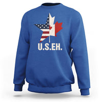 Royal blue sweatshirt with U.S.E.H text and US/Canada flag map graphic on front