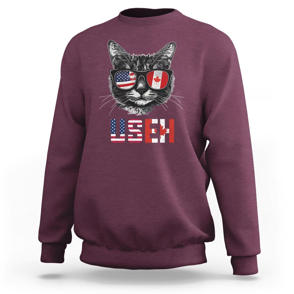 Maroon crewneck sweatshirt with graphic cat wearing flag sunglasses and US/EH text