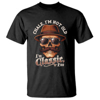 Black graphic T-shirt with skull face and “Chale I’m Not Old” print