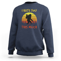 Navy crewneck sweatshirt with Bigfoot silhouette and “I HATE YOU THIS MUCH” print