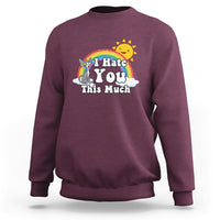 Maroon sweatshirt with rainbow cat graphic and "I Hate You This Much" text