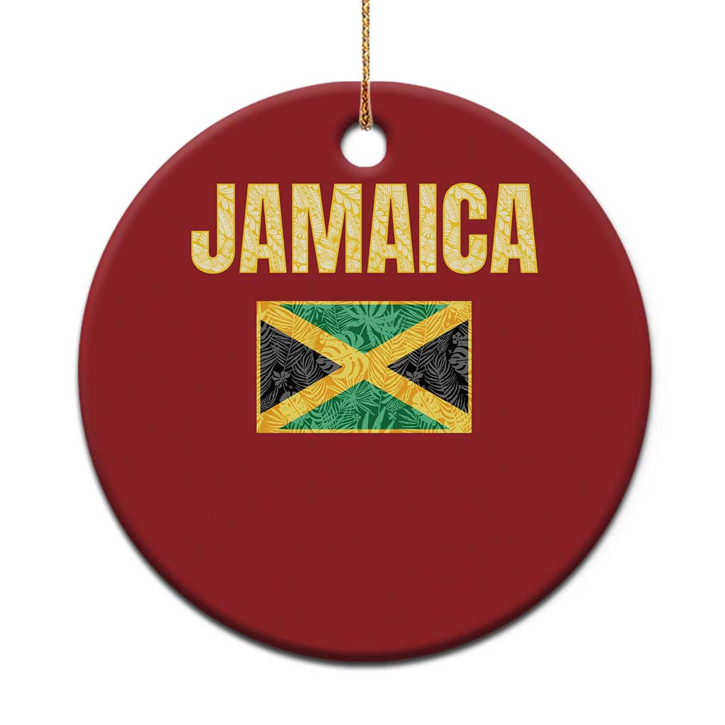 Red round Jamaica flag Christmas ornament with gold “JAMAICA” and hanging loop