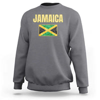 Gray crewneck sweatshirt with Jamaica text and flag graphic on back