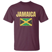 Maroon T-shirt with bold “JAMAICA” text and Jamaican flag graphic on front