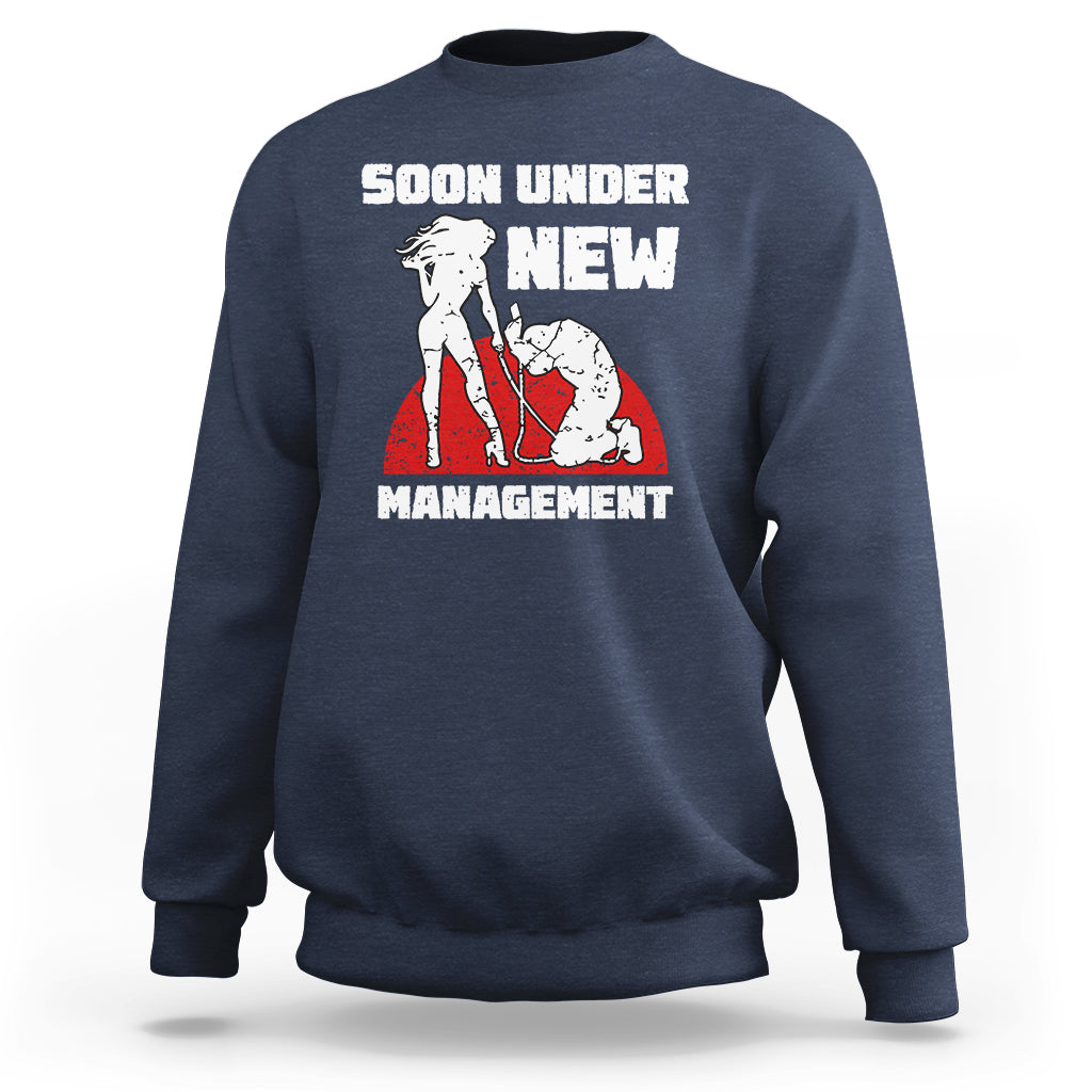 Navy crewneck sweatshirt with “Soon Under New Management” graphic