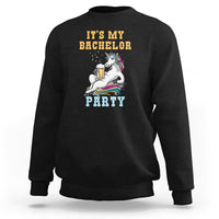 Black crewneck sweatshirt with “It’s My Bachelor Party” graphic and unicorn holding a beer