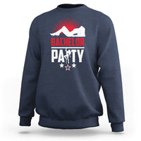 Blue bachelor party sweatshirt with red and white front graphic