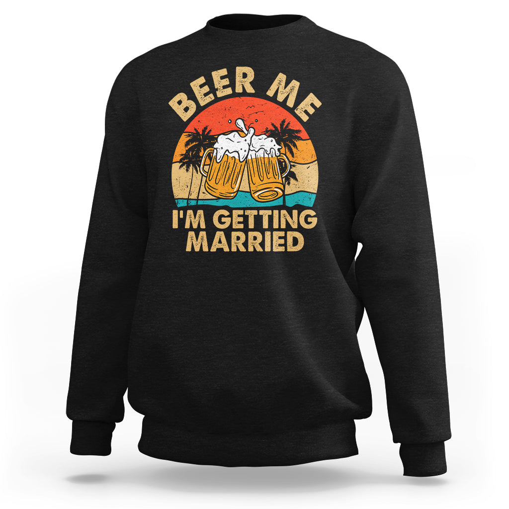 Black crewneck sweatshirt with Beer Me graphic and “I’m getting married” text