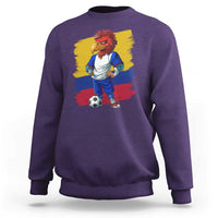 Purple football sweatshirt with lion mascot graphic and soccer ball, crewneck long sleeves