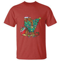 Red T-shirt with Bigfoot in Christmas lights holding gifts graphic