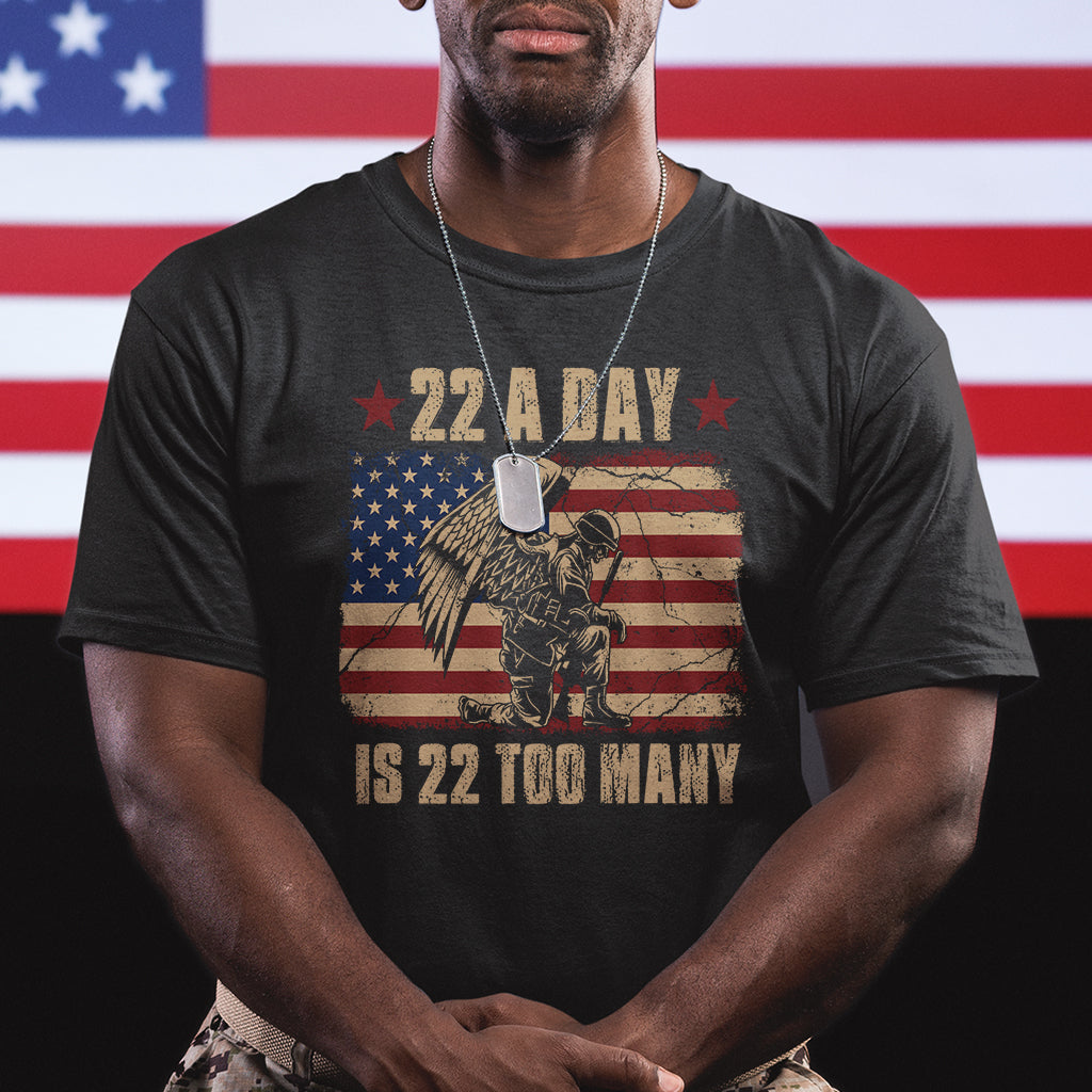 Men's black graphic T-shirt with “22 a day” and “is 22 too many” soldier American flag print