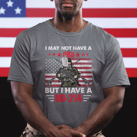 Men's patriotic T-shirt, charcoal gray with soldier and American flag stripes; text 'DD-214'