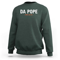 Dark forest green crewneck sweatshirt with front “DA POPE” text and small “Pope Leo XIV” line