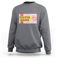 Dark heather gray sweatshirt with “Foster Mama” back graphic