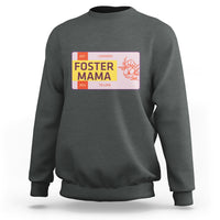 Charcoal gray sweatshirt with “Foster Mama” back graphic