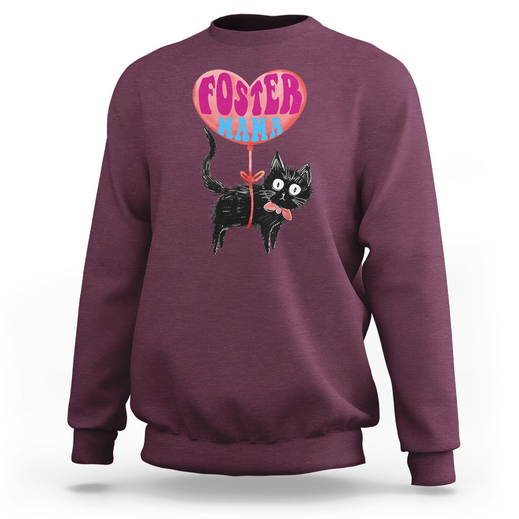 Maroon sweatshirt with foster cat mama graphic, crew neck and ribbed cuffs