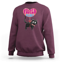 Maroon sweatshirt with foster cat mama graphic, crew neck and ribbed cuffs