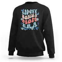 Black crewneck sweatshirt with colorful 'Bonus Mom' graphic on chest