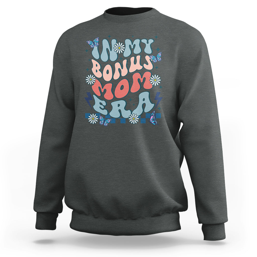 Dark heather gray crewneck sweatshirt with colorful 'Bonus Mom' graphic on chest