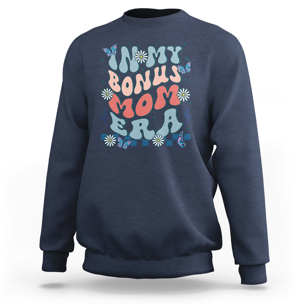 Navy crewneck sweatshirt with colorful 'Bonus Mom' graphic on chest