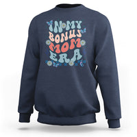 Navy crewneck sweatshirt with colorful 'Bonus Mom' graphic on chest