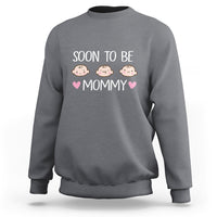 Maternity sweatshirt, heather gray crewneck with "Soon to Be Mommy" graphic and hearts