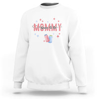 White maternity sweatshirt with “Soon To Be” graphic, baby shoes, and star accents
