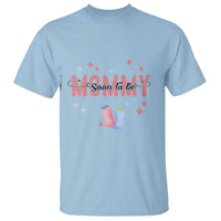 Light blue maternity T-shirt with “Soon to be Mommy” graphic and baby booties