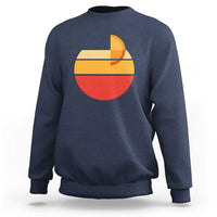 Navy Aperol Spritz sweatshirt with large retro sunset cocktail graphic on chest