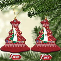 Two red Christmas tree-shaped ornaments with Mexican flag design, hanging on strings.