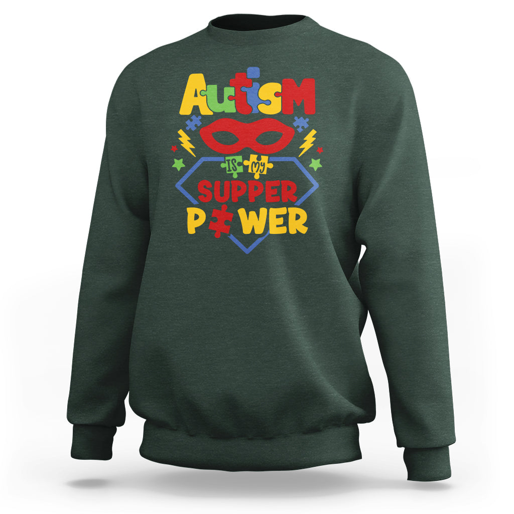 Forest green autism sweatshirt with colorful 'Super Power' front graphic, crewneck.