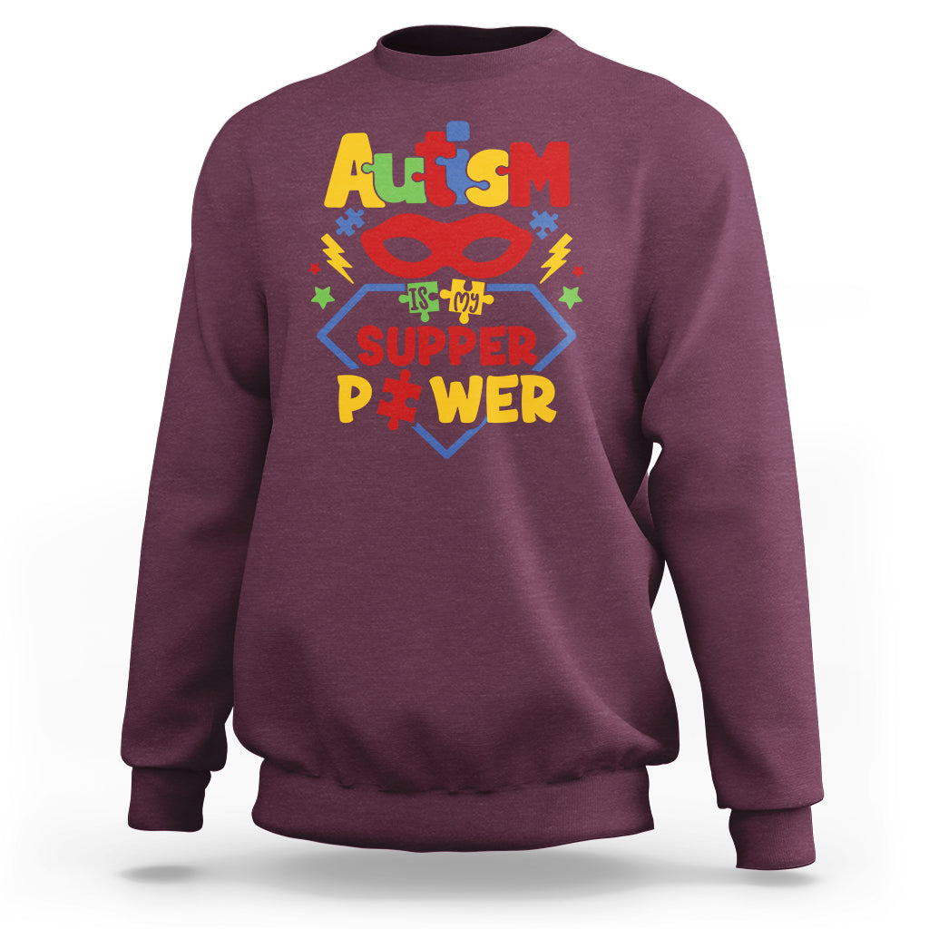 Maroon autism sweatshirt with colorful 'Super Power' front graphic, crewneck.