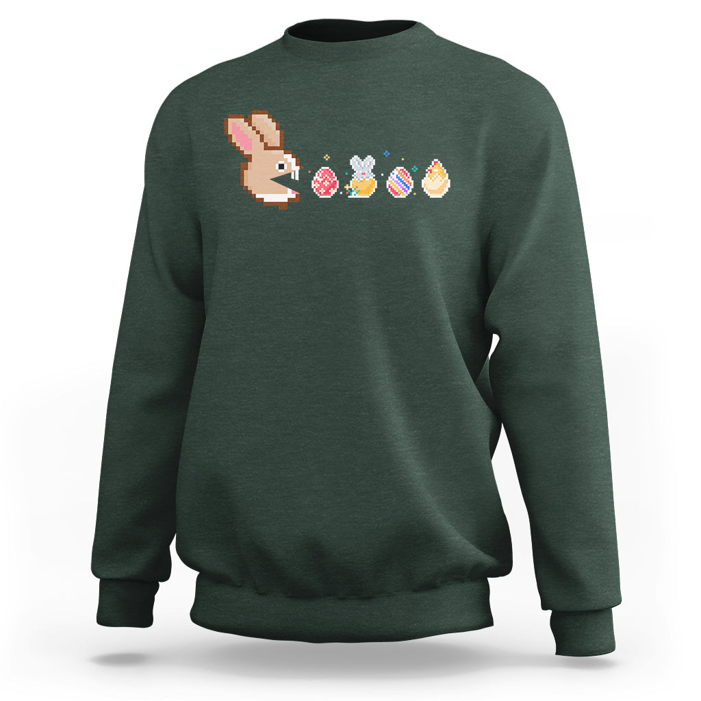Forest green crewneck sweatshirt with pixel bunny and Easter eggs graphic across chest