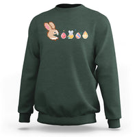 Forest green crewneck sweatshirt with pixel bunny and Easter eggs graphic across chest