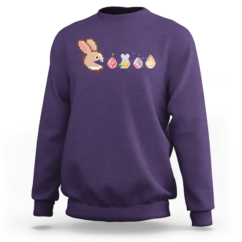 Purple crewneck sweatshirt with pixel bunny and Easter eggs graphic across chest