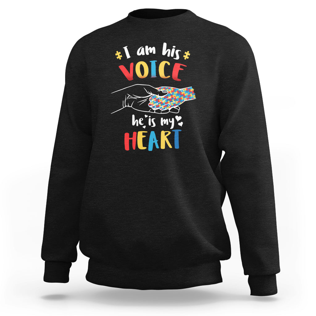 Black crewneck sweatshirt with autism awareness hand-heart graphic front