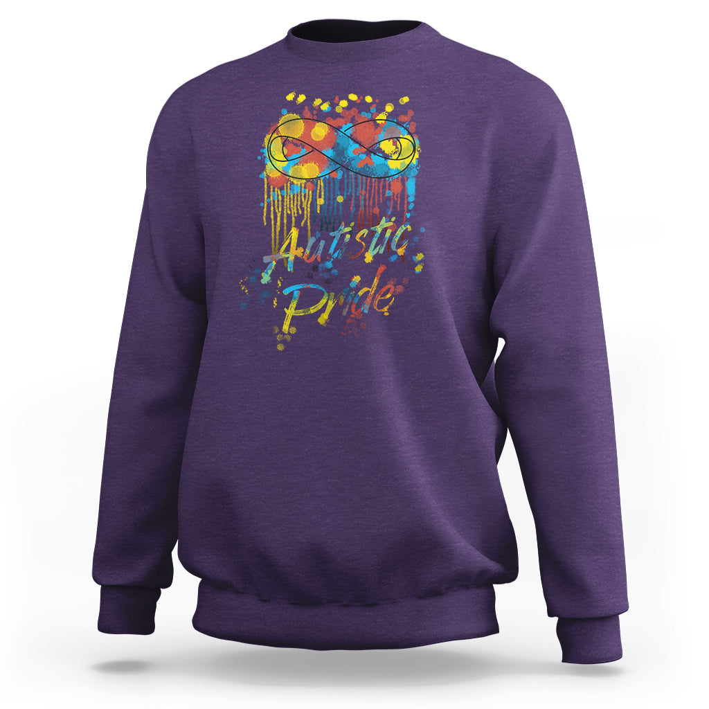 Purple sweatshirt with colorful "Autistic Pride" graphic and glasses on back